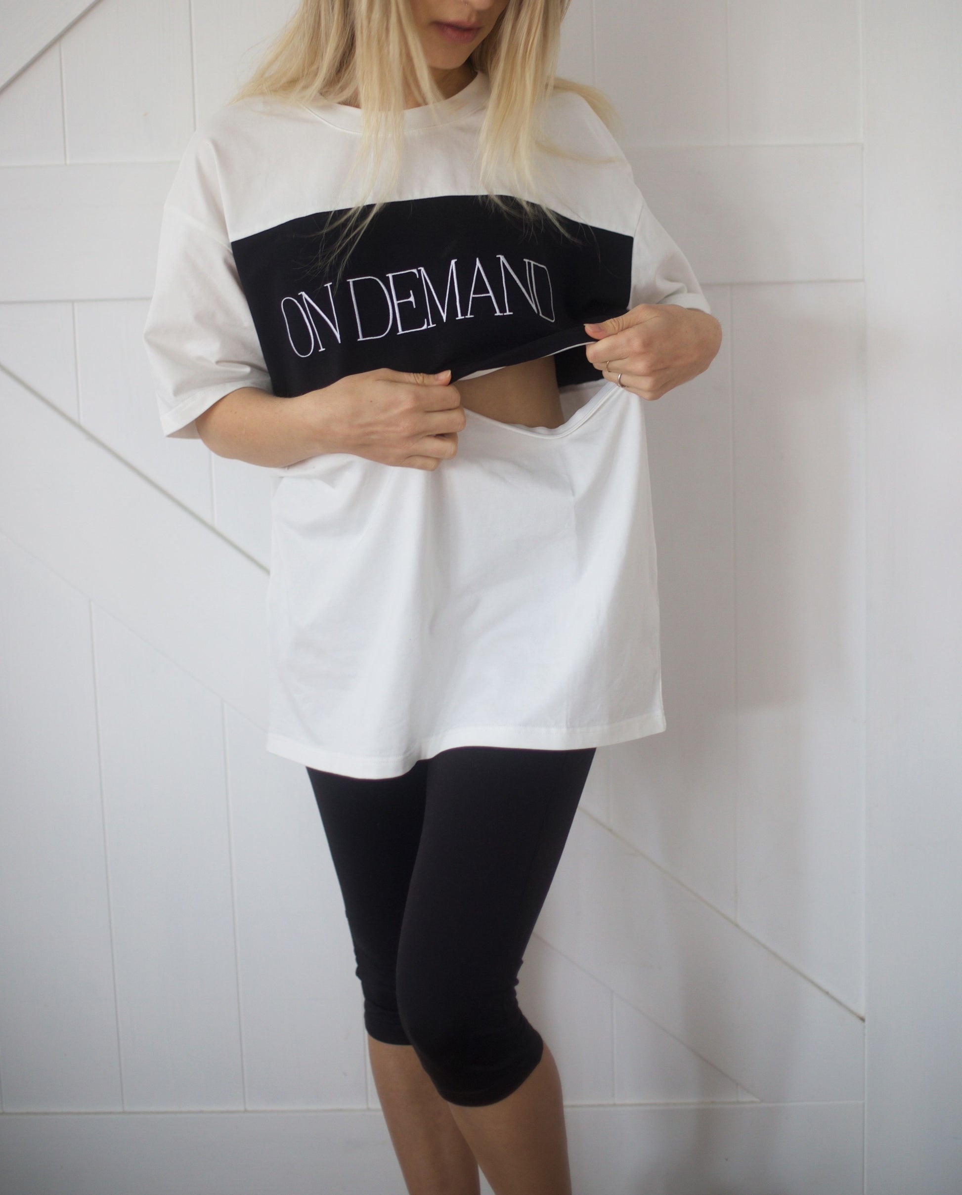 Model demonstrating hidden side zip nursing access on white On Demand breastfeeding tee – perfect for comfortable breastfeeding